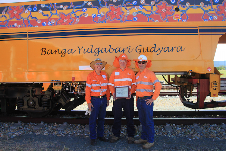 Aurizon’s Managing Director and CEO Lance Hockridge with the Manager for Mechanised Production Mick Keefe and the Vice President for Network Operations Clay McDonald in front of the new Banga Yulgabari Gudyara